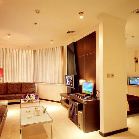 Dalian San Jiang Business Hotel Chambre photo