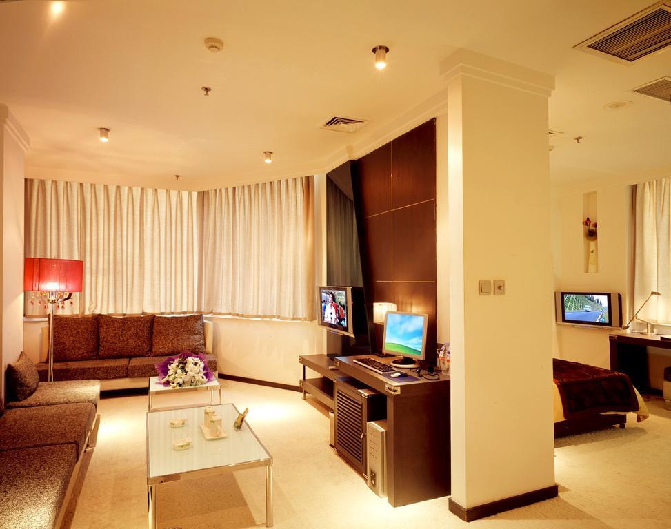 Dalian San Jiang Business Hotel Chambre photo